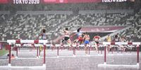 epa09387945 Runners cross the Hurdles in the Women's 400m Hurdles semi finals at the Athletics events of the Tokyo 2020 Olympic Games at the Olympic Stadium in Tokyo, Japan, 02 August 2021.  EPA-EFE/CHRISTIAN BRUNA