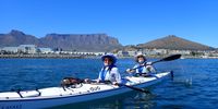 Kayaking in Table Bay on a perfect Summer’s day .<br>Table mountain seen from the sea at it’s most spectacular.