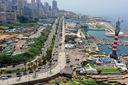 Lebanese protesters return to streets in car convoys amid coronavirus lockdown