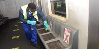 PRETORIA, SOUTH AFRICA - JUNE 30: A man cleans inside the train during Minister of Transport Fikile Mbalula visit to PRASA train station facilities to inspect preparation for lockdown operations on June 30, 2020 in Pretoria, South Africa. According to a media release, PRASA has been engaged with preparations for the resumption of duties. (Photo by Frennie Shivambu/Gallo Images via Getty Images)