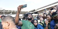 Siya Kolisi interacts with fans during a send-off function at OR Tambo International Airport on 12 August, 2023. (Photo: Sydney Seshibedi/Gallo Images)