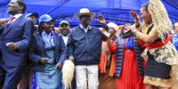 Kenya's Azimio la Umoja (Declaration of Unity) political coalition presidential candidate and Kenya's opposition leader Raila Odinga (centre), and his running-mate, Martha Karua (second left), join local artists during their performance at a political rally in Kirigiti Stadium, Kiambu, Kenya, 01 August 2022. (Photo: EPA-EFE / Daniel Irungu)