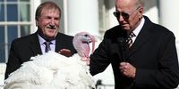 WASHINGTON, DC - NOVEMBER 21: U.S. President Joe Biden pardons Chocolate, the National Thanksgiving Turkey, as he is joined by the 2022 National Turkey Federation Chairman Ronnie Parker on the South Lawn of the White House November 21, 2022 in Washington, DC. Chocolate, and the alternate, Chip, were raised at Circle S. Ranch, outside of Charlotte, North Carolina, and will reside on the campus of North Carolina State University following today's ceremony. (Photo by Win McNamee/Getty Images)