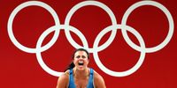 epa09385916 Patricia Strenius of Sweden reacts in the women's 76kg category group A during the Weightlifting events of the Tokyo 2020 Olympic Games at the Tokyo International Forum in Tokyo, Japan, 01 August 2021.  EPA-EFE/HEDAYATULLAH AMID