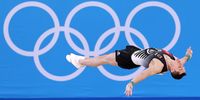 TOKYO, JAPAN - JULY 24: Andreas Toba of Team Germany warms up in the floor exercise prior to Men's Qualification on day one of the Tokyo 2020 Olympic Games at Ariake Gymnastics Centre on July 24, 2021 in Tokyo, Japan. (Photo by Laurence Griffiths/Getty Images)