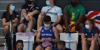 TOKYO, JAPAN - AUGUST 01: Tom Daley of Great Britain knits as he watches the Women's 3m Springboard Final on day nine of the Tokyo 2020 Olympic Games at Tokyo Aquatics Centre on August 01, 2021 in Tokyo, Japan. (Photo by Clive Rose/Getty Images)