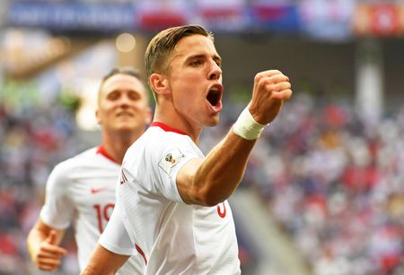 In Pictures: Japan booed off after Poland loss, but through to knockouts
