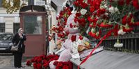 A woman stands in front of flowers placed in memory of the victims in Palestine near the Palestinian embassy in Moscow, Russia, 17 October 2023. Thousands of Israelis and Palestinians have died since the militant group Hamas launched an unprecedented attack on Israel from the Gaza Strip on 07 October 2023, leading to Israeli retaliation strikes on the Palestinian enclave.  EPA-EFE/YURI KOCHETKOV