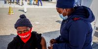 A man gets vaccinated at the Bara taxi rank in Soweto, Johannesburg, on 18 August 2021. (Photo: Shiraaz Mohamed)