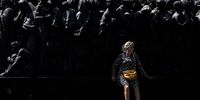 A woman sits next to the 'Angels Unaware' monument at Saint Peter's Square, Vatican City, 28 July 2024. The last weekend of July is expected to be the so far hottest of 2024, the Italian National Meteorological Service 'ItaloMeteo' predicts, as temperatures will rise to up to 39 to 40 degrees Celsius, even in the North of the country.  EPA-EFE/FABIO FRUSTACI