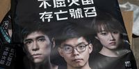 A election poster shows pro-democracy primary candidates for the legislative election Lester Shum, (L), Joshua Wong, (C), and Jannelle Leung, (R), during a campaign event in Hong Kong, China, 11 July 2020. Hongkongers' activists fear Beijing's security laws will harm democrats' chances of winning by banning anti-government candidates from September poll.  EPA-EFE/JEROME FAVRE