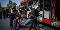Police officers remove activists from Extinction Rebellion blocking the A12 in The Hague, Netherlands, 27 May 2023. With the action, Extinction Rebellion wants to make the Dutch government know it opposes fossil subsidies. During the most recent blockade on 11 March some 700 activists were arrested.  EPA-EFE/Sem van der Wal