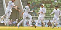 South Africa's players celebrate after the dismissal of Bangladesh captain Najmul Hossain Shanto during the second day of the first Test against Bangladesh at the Sher-e-Bangla National Cricket Stadium in Dhaka on 22 October 2024. (Photo: Tanvin Tamim / AFP)