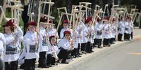 An ultra orthodox yeshiva children hold nooses and handcuffs with shirts reading in Hebrew 'We will die and not join the army'  as they take part in a protest procession against Ultra Orthodox army recruitment, in Jerusalem, 20 March 2024. Israel's Supreme Court is debating a law on the recruitment of ultra-Orthodox Jews into the Israeli army as a legal deadline looms at the end of March.  EPA-EFE/ABIR SULTAN