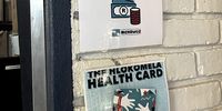 UNLIMITED CONSULTATIONS: An educational poster of Hlokomela’s health club card, which gives subscribers unlimited visits to a doctor or nurse for a year at the clinic. (Photo: Zano Kunene/Bhekisisa)
