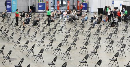 California issues shot mandate for teachers; South Africa registers 7,502 new cases