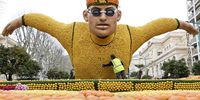 A man works on a sculpture made with lemons and oranges ahead of the 90th Lemon Festival in Menton, France, 16 February 2024. This year, the festival's theme is 'From Olympia to Menton' and runs from 17 February to 03 March 2024. Located next to the Italian border, Menton is renowned for its citric fruit industry, boosted by a temperate Mediterranean climate. Local legend says that the Biblical Eve buried a lemon in the ground at the Bay of Garavan; the town of Menton later sprang up from that spot.  EPA-EFE/SEBASTIEN NOGIER