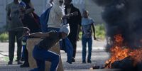 CAPE TOWN, SOUTH AFRICA – JULY 28: Happy Valley residents protest by burning tyres and blocking roads on July 28, 2025 in Cape Town, South Africa. According to the police, the reason for the protest is not known. (Photo by Gallo Images/Die Burger/Jaco Marais)