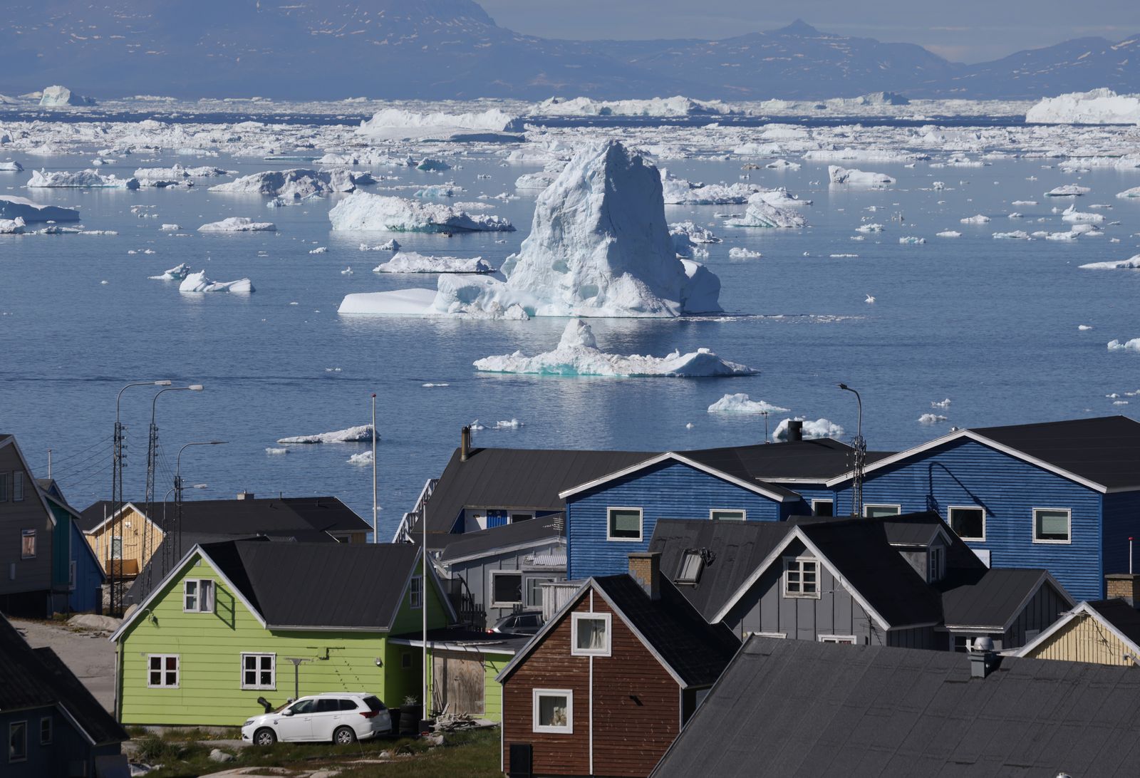 ILULISSAT, GREENLAND - JULY 16: Icebergs drift by in Disko Bay on July 16, 2024 at Ilulissat, Greenland. Earlier this year scientists released a study in which 