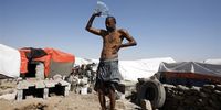 epa09711755 Displaced Yemeni Jamal Ali Othman takes a shower outdoors, using a plastic bottle to pour water on his body at a camp for internally displaced persons (IDPs) on the outskirts of Sana'a, Yemen, 08 January 2022 (issued 27 January 2022). The escalating war in Yemen has left millions in dire need of humanitarian and health assistance, pushing the United Nations to consider the humanitarian crisis in the Arab country as the worst in the world, with 80 percent of the 30 million-population in need of relief and protection. Some 47 Yemeni families live without much-needed privacy at an IDPs camp on the outskirts of the Houthi-controlled capital Sana'a. The IDPs camps in the war-ridden Arab country are not equipped with safe sanitation services, so the displaced are forced to defecate outdoors at the vacant lands nearby or use plastic bags inside their shelters, causing environmental pollution and the spread of diseases, including cholera. Health and environmental risks in Yemen have been a serious challenge following hunger, which rapidly affects millions of vulnerable people since the full-scale war broke out in March 2015. The UN High Commissioner for Refugees recently estimated that the total number of IDPs in Yemen rose to over 4.2 million after over 1,200 families fled their homes in the first two weeks of 2022. UNICEF estimates that less than 10 percent of internally displaced Yemenis have access to toilets.  EPA-EFE/YAHYA ARHAB