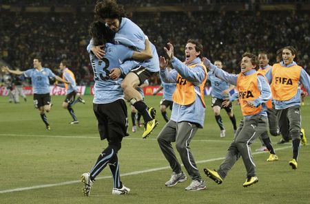 Uruguay come back from dead, wrest penalty lottery from Ghana