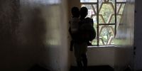 Migrant children in Durban climb the stairs to the apartment where their family lives on the ninth floor. (Photo: Leila Dougan / Daily Maverick)