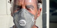 Sven ten Bokkel Huinink wearing one of the face shields he designed and had manufactured. (Photo supplied)
