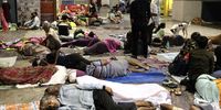 Passengers rest at a railway station after trains have been suspended, ahead of Cyclone Dana's landfall, in Kolkata, India, 24 October 2024. Severe cyclonic storm 'Dana' is expected to make landfall between late 24 October and early 25 October with a wind speed of 100-120 kmph, and impact mostly the eastern Indian state Odisha, and coastal districts of West Bengal, according to India Meteorological Department (IMD). More than 500,000 people have been relocated to cyclone shelters in Odisha, according to local authorities.  EPA-EFE/PIYAL ADHIKARY