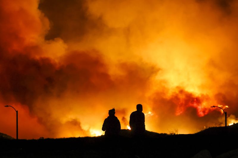 New wildfire near Los Angeles explodes to 9,400 acres, forces evacuations