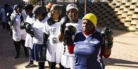 Constance Ngubane, 86  (R) leads the twice weekly boxing grannies training session run by the 'A Team' gym in Cosmo City, Johannesburg, South Africa, 15 August 2024. The boxing grannies is the brain child of former body builder Claude Maphosa aka 'Coach', who started training the grannies in 2013. Many of them come to the training to keep fit and learn how to defend themselves. The ladies train twice a week for an two hours and the youngest grannie is 60 with the oldest being 86 years old. The boxing also helps the elderly with active aging, cardio and cognitive movement.  EPA-EFE/KIM LUDBROOK  ATTENTION: This Image is part of a PHOTO SET