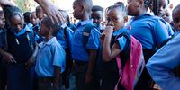Emotional day as unplaced learners, flooding and overcrowding mar first day of school