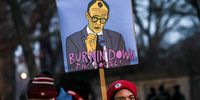 A protester holds a poster of Chairman of the Christian Democratic Union (CDU) party Friedrich Merz during a rally outside the Christian Democratic Union (CDU) party's headquarters in Berlin, Germany, 09 February 2025. The protest was organized against the CDU cooperation with far-right party Alternative for Germany (AfD), after the CDU's motion in the German parliament won a majority with the help of AfD votes.  EPA-EFE/FILIP SINGER