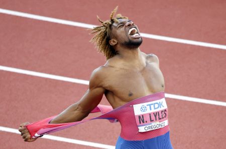 Noah Lyles retains 200m crown as Americans sweep podium