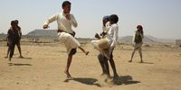 epa10016853 Displaced Yemenis play soccer at an internally displaced persons (IDP) camp on the outskirts of Sana'a, Yemen, 13 June 2022 (issued 16 June 2022). A UN-brokered nationwide truce has been going on in Yemen since early April 2022, halting military operations across Yemen and Houthis-launched cross-border attacks on Saudi Arabia. Yemen has been in the grip of an armed conflict between the Saudi-backed government and the Houthis since March 2015, causing the internal displacement of 4.3 million Yemenis.  EPA-EFE/YAHYA ARHAB