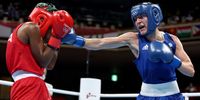 TOKYO, JAPAN - JULY 26: Jucielen Romeu (L) of Brazil exchanges punches with Karriss Artingstall of Great Britain during the Women's Feather (54-57kg) on day three of the Tokyo 2020 Olympic Games at Kokugikan Arena on July 26, 2021 in Tokyo, Japan. (Photo by Buda Mendes/Getty Images)
