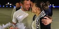 SA boxing champ Chris van Heerden greets his girlfriend Ksenia Karelina on the tarmac at Washington DC airport after she was released from a Russian prison. [Picture supplied]