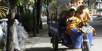Thai Buddhist monks transport recyclable plastic bottles using a three-wheel vehicle at Wat Chak Daeng temple in Samut Prakan province, Thailand, 29 May 2023. Issued 01 June 2023 At What Chak Daeng temple, Thai Buddhist monks have set up a cooperative between the temple and community members to recycle used polyethylene terephthalate (PET) plastic bottles and transform them into saffron robes. The World will mark the 2023 Environment Day on 05 June with a  focus on "solutions to plastic pollution".</p>
<p>While worshippers in other temples usually donate food and daily necessities as alms, here they are encouraged to collect and bring in used or discarded plastic bottles. The monks then sort them accordingly from the non-recyclable trash. Workers help to crunch and press them into portable bales to be transported to factories where they are shredded into flakes, manufactured into polyester fibres, spun into yarns and then weaved and dyed into saffron coloured fabrics. The recycled cloth is then returned to the temple where volunteers cut and sew them into new saffron robes for the monks. About 60 1.5 litre plastic bottles can be converted to one set of robes for the monks. The temple usually receives donations of about 10 tons of plastic bottles per month.</p>
<p>Thailand is one of the world's largest plastic polluters with more than two millions tons of plastic waste generated each year. The Thai government announced in February 2023 that it will completely ban the import of all plastic waste effective from 1st January 2025.  EPA-EFE/NARONG SANGNAK  ATTENTION: This Image is part of a PHOTO SET