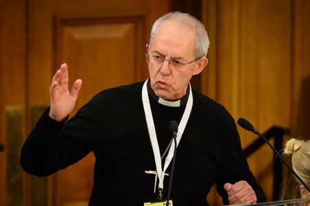Church of England faces pressure over abuse scandal after Archbishop quits