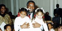 June 1995. South African deputy president Thabo Mbeki  holds Roxanne King and Kelly Bester (both 5)  on Children's Day.