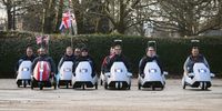 A group of owners ride their Sinclair C5 electric vehicles at an event to mark the 40th anniversary of their launch, on January 10, 2025 in London, England. The Sinclair C5, a single-seat battery-powered tricycle was developed by inventor Sir Clive Sinclair, and is widely recognised as the first personal electric vehicle. Although the marketing launch event at Alexandra Palace forty years ago was considered a failure, the C5 has more recently garnered renewed interest from collectors and electric vehicle enthusiasts.  (Photo by Leon Neal/Getty Images)