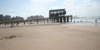 While Durban’s central beaches were being washed away because of a shortage of sand, the pier and water extraction wells in front of uShaka Marine World (to the south of the central beaches) were stranded above the water because of too much sand-pumping in the wrong places. (Photo: Tony Carnie)