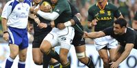 Bryan Habana of South Africa is grabbed by Dan Carter of New Zealand during The Castle Rugby Championship match between South Africa and New Zealand at Soccer City Complex in Johannesburg on 6 October 2012. (Photo: Duif du Toit / Gallo Images)