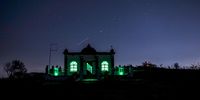 A shooting star over Kramat Of Sheikh Mohamed Hassen Ghaibie Shah captured at night on Signal Hill.</p>
<p>A 30-second exposure
