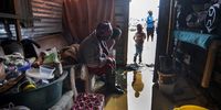 Heavy rain flooded homes in Lwandle informal settlement in Strand on 6 June 2024. (Photo: Gallo Images / Brenton Geach)
