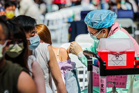 Taiwan's daily Covid-19 cases top 10,000 for first time