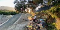Lockdown fun, BMX dirt bike jumping at sunset.  Soetvlei, Constantia, Cape Town.