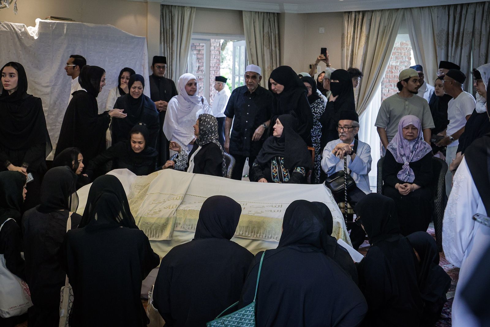 Wife of Malaysia’s longest-serving PM Mahathir dies aged 100