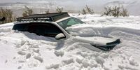 A vehicle trapped by the recent snowstorm over the heritage weekend of 19-22 September, on its way to Witsieshoek Mountain Lodge in the Drakensberg, about 3km from the lodge. Snow was about 2m deep in some places.<br>(Photo: Groenewald Basson / Severe Weather and Information Centre SA)