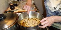 Drained hot gnocchi are tipped straight into the duck stock. Photo: Margot Patterson