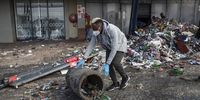16 July 2021. A volunteer cleans up at Jabulani Mall in Soweto. Picture: James Oatway.